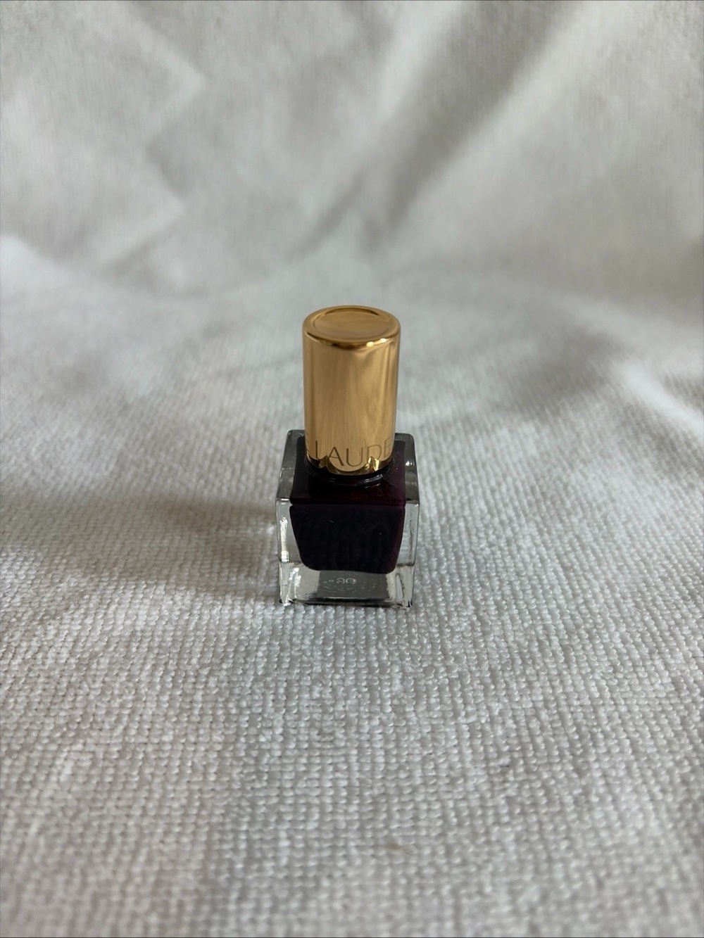 Estée Lauder Deep Plum Nail Polish with Gold Cap